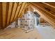 Unfinished attic space with exposed beams and ample storage potential at 125 Cotton Fields Ln # 26, Fuquay Varina, NC 27526