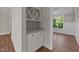 Built-in wet bar with wine rack and granite countertop at 125 Cotton Fields Ln # 26, Fuquay Varina, NC 27526