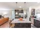 Modern kitchen with stainless steel appliances and granite countertops at 901 Wildflower Ridge Rd, Wake Forest, NC 27587