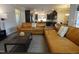 Spacious living room with leather sofas and a coffee table at 901 Wildflower Ridge Rd, Wake Forest, NC 27587