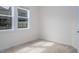 Bright bedroom with neutral carpeting and large windows at 2921 Macbeth Ln, Apex, NC 27502
