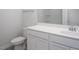 Bathroom with white vanity and toilet at 2921 Macbeth Ln, Apex, NC 27502