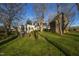 View of the property showing the main house and outbuildings at 6720 Mebane Oaks Rd, Mebane, NC 27302
