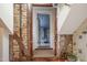 Unique hallway with exposed brick and wooden beams at 6720 Mebane Oaks Rd, Mebane, NC 27302