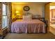 Quaint bedroom with antique day bed and window seat at 6720 Mebane Oaks Rd, Mebane, NC 27302