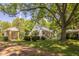 Landscaped grounds with a charming historic home at 6720 Mebane Oaks Rd, Mebane, NC 27302