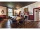 Spacious dining room with wooden floors and fireplace at 6720 Mebane Oaks Rd, Mebane, NC 27302