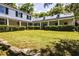 Two-story white home with wrap around porch at 6720 Mebane Oaks Rd, Mebane, NC 27302