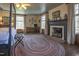 Bright bedroom with fireplace and large windows at 6720 Mebane Oaks Rd, Mebane, NC 27302