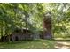 Rustic barn with silo on a tree-lined property at 6720 Mebane Oaks Rd, Mebane, NC 27302