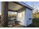 White storage shed with brick column and wheelbarrow at 6720 Mebane Oaks Rd, Mebane, NC 27302