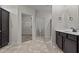 Main bathroom with double vanity, toilet and walk-in closet at 127 Hillwood Dr, Sanford, NC 27332