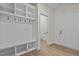 Laundry room with utility sink and shelving at 127 Hillwood Dr, Sanford, NC 27332