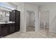 Main bathroom with double vanity, toilet and walk-in closet at 127 Hillwood Dr, Sanford, NC 27332