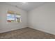 Simple bedroom with neutral walls and carpeted floors at 127 Hillwood Dr, Sanford, NC 27332