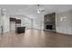 Spacious living room with fireplace and kitchen views at 127 Hillwood Dr, Sanford, NC 27332