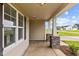 Front porch with stone pillars and exterior lighting at 127 Hillwood Dr, Sanford, NC 27332