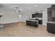 Open living room and kitchen area with hardwood floors at 127 Hillwood Dr, Sanford, NC 27332