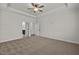 Spacious bedroom with carpeted floors and access to bathroom at 127 Hillwood Dr, Sanford, NC 27332