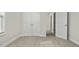 Spacious bedroom with carpet flooring and double door closet at 53 Hillwood Dr, Sanford, NC 27332