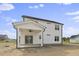 Two-story house with covered patio and white siding at 53 Hillwood Dr, Sanford, NC 27332