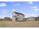 Rear view of two-story house, showcasing backyard at 53 Hillwood Dr, Sanford, NC 27332
