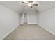 Bright bedroom featuring carpeted floor and an open door at 53 Hillwood Dr, Sanford, NC 27332