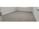 Simple bedroom with carpeted floor and neutral walls at 53 Hillwood Dr, Sanford, NC 27332