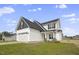 Two-story house with white siding, gray roof, and a two-car garage at 53 Hillwood Dr, Sanford, NC 27332