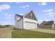 Two-story house with white siding, gray roof, and a two-car garage at 53 Hillwood Dr, Sanford, NC 27332