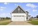 Two-story house with white siding, gray roof, and a two-car garage at 53 Hillwood Dr, Sanford, NC 27332