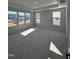 Spacious bedroom with gray carpet and multiple windows at 1031 Westerland Way # 46, Durham, NC 27703