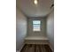 Cozy bedroom with built-in window seat and hardwood floors at 1031 Westerland Way # 46, Durham, NC 27703
