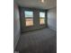 Well-lit bedroom featuring two large windows at 1031 Westerland Way # 46, Durham, NC 27703