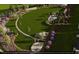 Scenic community park with a grassy area and fitness equipment at 1031 Westerland Way # 46, Durham, NC 27703
