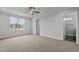 Spacious bedroom with carpeted floor, large window, and ceiling fan at 188 Hillwood Dr, Sanford, NC 27332