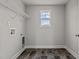 Laundry room with shelving and tile flooring at 188 Hillwood Dr, Sanford, NC 27332