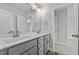 Modern bathroom with double vanity and gray cabinets at 188 Hillwood Dr, Sanford, NC 27332