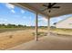 Covered back porch with ceiling fan, overlooking open yard at 188 Hillwood Dr, Sanford, NC 27332
