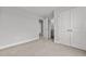 Well-lit bedroom with access to a bathroom and double closets at 188 Hillwood Dr, Sanford, NC 27332