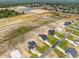 Aerial view of a new neighborhood with several houses and open green spaces at 188 Hillwood Dr, Sanford, NC 27332