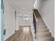 Bright and spacious entryway with hardwood floors and staircase at 188 Hillwood Dr, Sanford, NC 27332