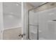 Clean bathroom with a tiled shower and glass enclosure at 188 Hillwood Dr, Sanford, NC 27332