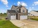 Two-story home with two-car garage and brick accents at 188 Hillwood Dr, Sanford, NC 27332