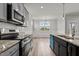 Modern kitchen featuring stainless steel appliances and granite countertops at 188 Hillwood Dr, Sanford, NC 27332