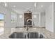 Stainless steel double sink with a modern faucet in the kitchen at 188 Hillwood Dr, Sanford, NC 27332