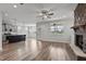 Open living room showcasing a stone fireplace and kitchen with island at 188 Hillwood Dr, Sanford, NC 27332