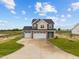 Two-story home with two-car garage and landscaped yard at 188 Hillwood Dr, Sanford, NC 27332