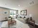 Virtually staged living room with neutral color palette at 73 Calluna Dr, Clayton, NC 27520