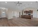 Open concept living room with kitchen and high ceilings at 152 Hillwood Dr, Sanford, NC 27332